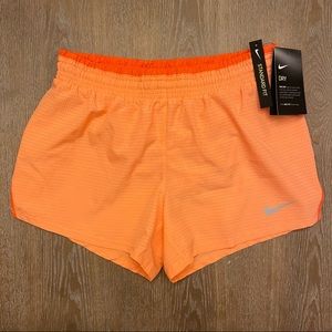NIKE Women’s Standard Dri-FIT Mesh Running Shorts